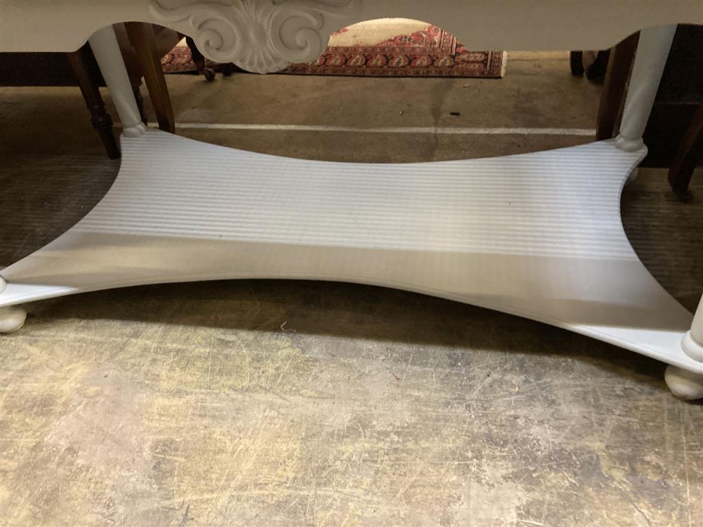A rectangular painted caned top two tier coffee table, length 120cm, depth 66cm, height 58cm